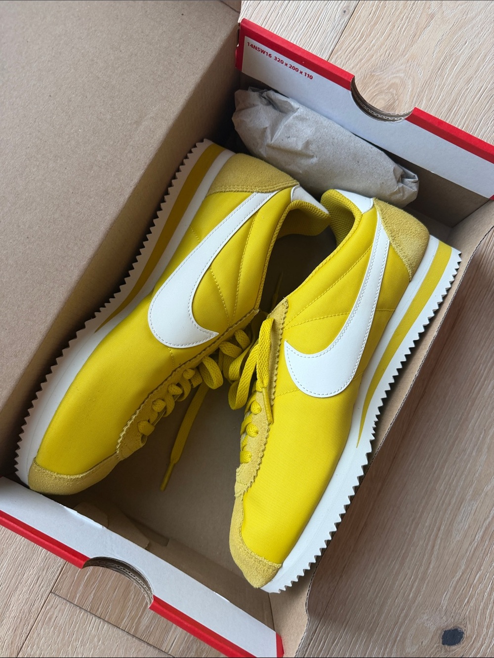 Nike Women’s Yellow and White Classic Cortez Sneakers